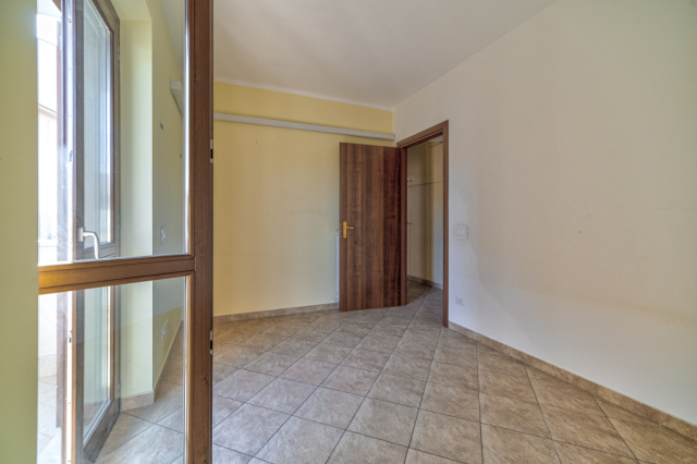 Ampio appartamento con box e posto auto