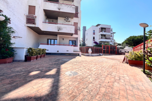 Appartamento con piscina condominiale