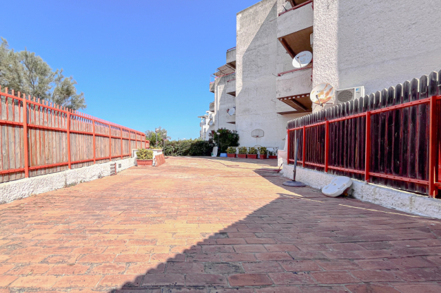 Appartamento con piscina condominiale